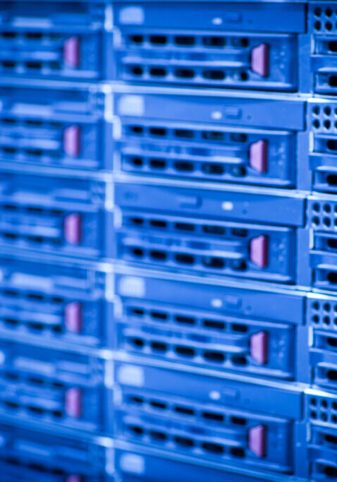 Server rack cluster in a data center (shallow DOF; color toned i Server rack cluster in a data center (shallow DOF; color toned image)