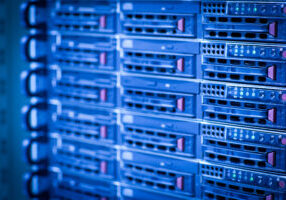Server rack cluster in a data center (shallow DOF; color toned image)